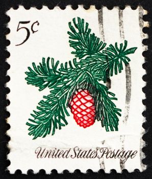 UNITED STATES OF AMERICA - CIRCA 1964: a stamp printed in the USA shows Sprig of Conifer, Christmas, circa 1964