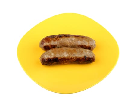 grilled sausage on a plate isolated on white background