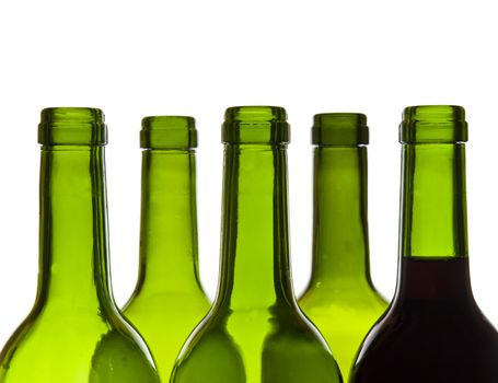 Wine bottles close-up isolated over white background