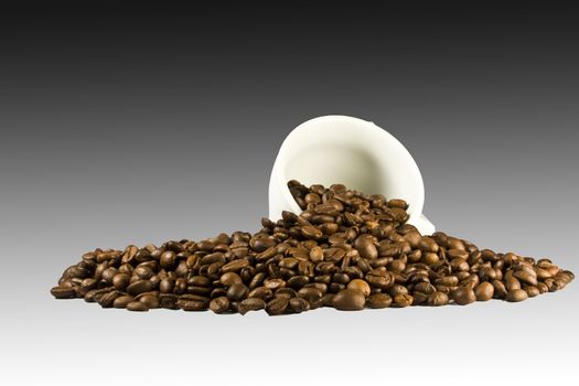 The cup of coffee and beans, isolated on white background.