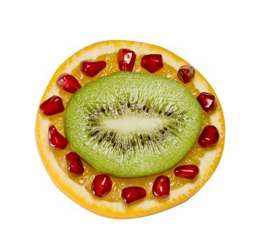 Orange kiwi and pomegranate grains on white background

