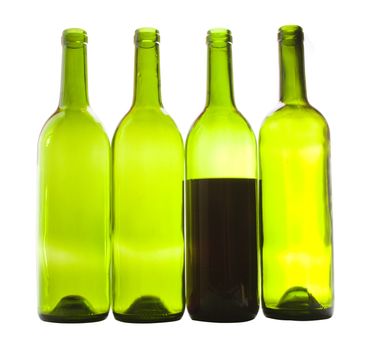 Wine bottles close-up isolated over white background