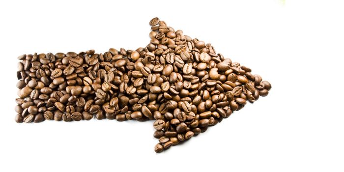 arrow made from coffe beans, on white background