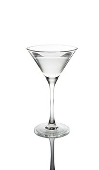 Glass of martini with reflexion on a white background
