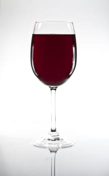 Glass with red Wine, on white backgroundound