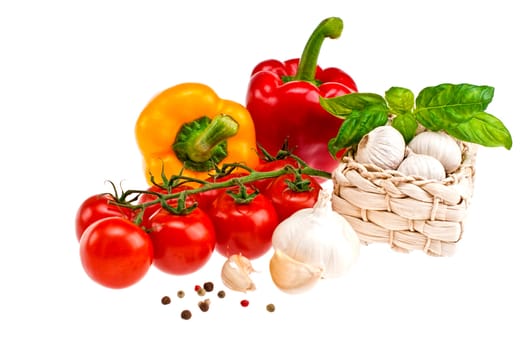 Peppers, tomatoes, garlic, shot on a white background.