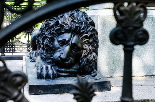 Sad Lion at the foot of the monument of king Carl Johan Oslo, Norway