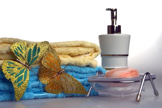 bath belongings, soap, towel, perfumery, prepared for the use on a white background