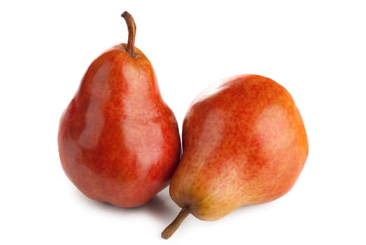 Two ripe juicy pears on a white background