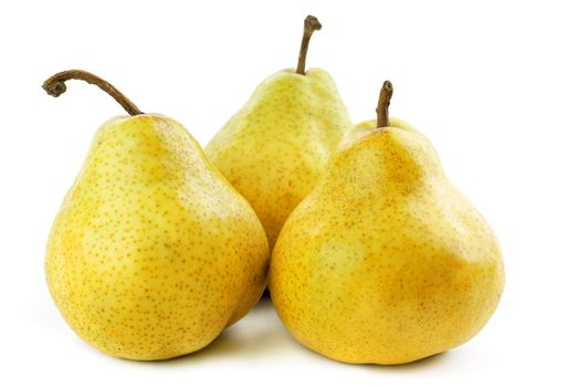 Three ripe and juicy pears on a white background