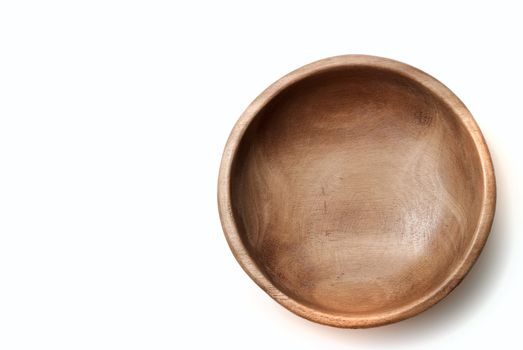 One empty wooden salad bowl on a white background