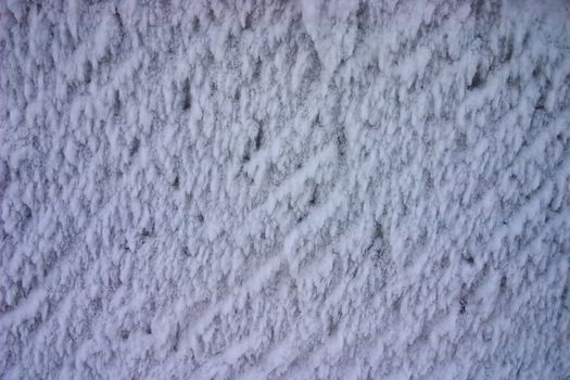 texture image of ice-covered surface with shallow details