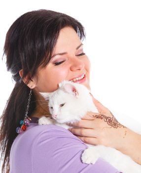 Young pretty woman hold her lovely white cat. Isolated on a white background