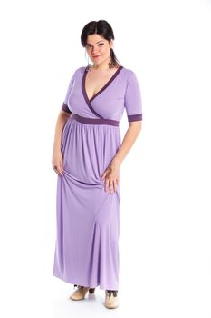 Beautiful young woman in purple, isolated on white background
