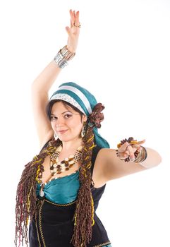 Oriental dancer in blue costume over white background
