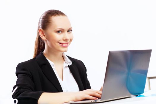 Business woman working on computer in office