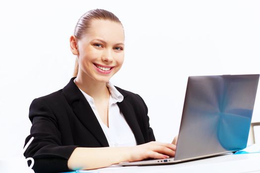 Business woman working on computer in office