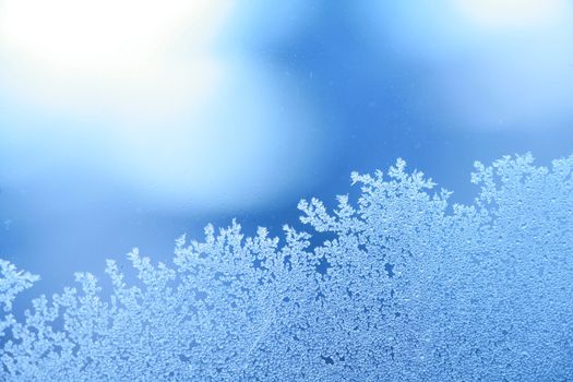 The patterns made by the frost on the window (hoarfrost background)