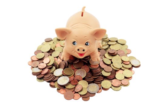 piggy bank with a Porky on heap of euro coins and cents trimmed and isolated