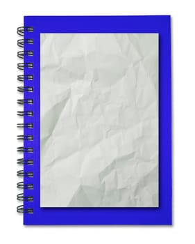 Crumpled paper on blue notebook