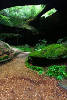 Natural Rock Bridge spans the lush forests of Alabama in the southern USA.