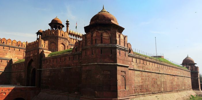  The Red Fort  is a 17th century fort complex constructed by the Mughal emperor Shah Jahan in the walled city of Old Delhi that served as the residence of the Mughal Emperors.  It was designated a UNESCO World Heritage Site in 2007. It covers a total area of about 121.34 acres.
