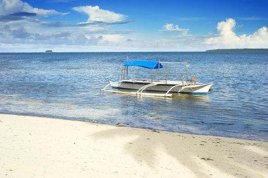 Tropical landscape with traditional Philippines boat on Shiargao island, Philippines