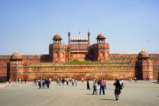 Delhi, India - February 02, 2012: The Red Fort  is a 17th century fort complex constructed by the Mughal emperor Shah Jahan in the walled city of Old Delhi that served as the residence of the Mughal Emperors.  It was designated a UNESCO World Heritage Site in 2007. It covers a total area of about 121.34 acres.