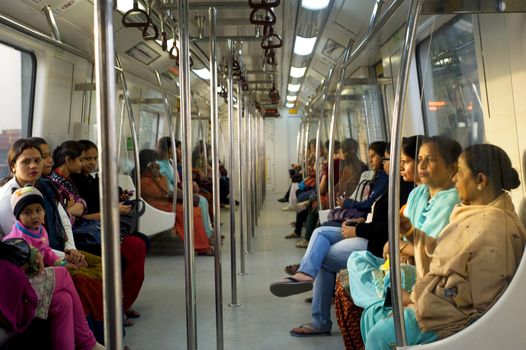 Delhi, India - February 03, 2012:  Women-Only Subway Cars  in Delhi. Delhi Metro network consists of six lines with a total length of 189.63 kilometres (117.83 mi) with 142 stations
