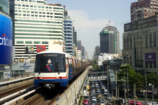 Bangkok, Thailand - March 17, 2012: BTS Skytrain  in Bangkok. The Bangkok Mass Transit System, commonly known as the BTS Skytrain, is an elevated rapid transit system in Bangkok. The system consists of 32 stations along two lines