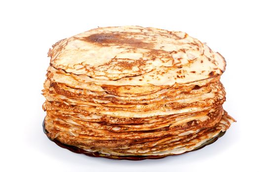 Pile of pancakes on a plate on a white background