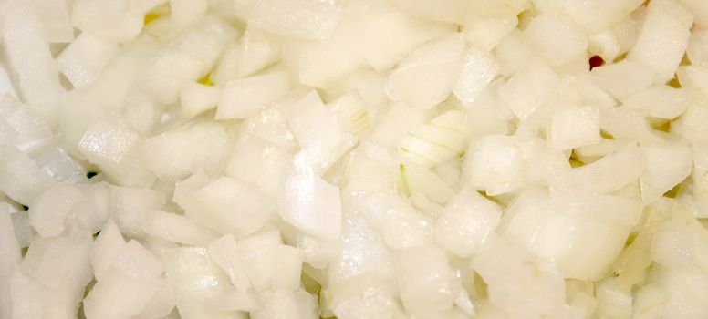 Chopped white onions ready for salad or cooking.