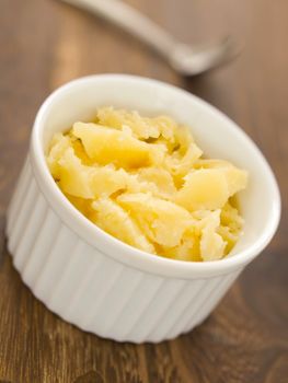 close up of a bowl of indian ghee