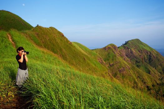 woman photographer in the mountain