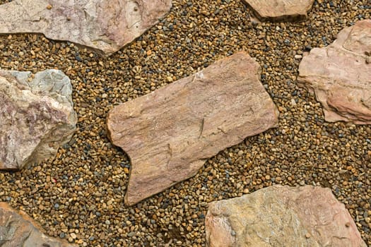 Large stone tablet with small on the floor