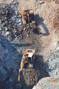 Excavator working on a mountain