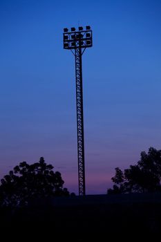 Stadium lights on a sports field at night