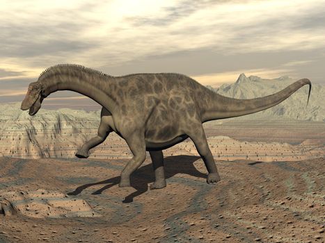 Big dicraeosaurus dinosaur walking in the rocky desert by cloudy day