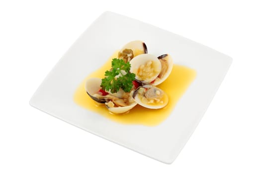 dish of clams in wine sauce and olive oil with chopped parsley and garlic pepper onion cut off and isolated