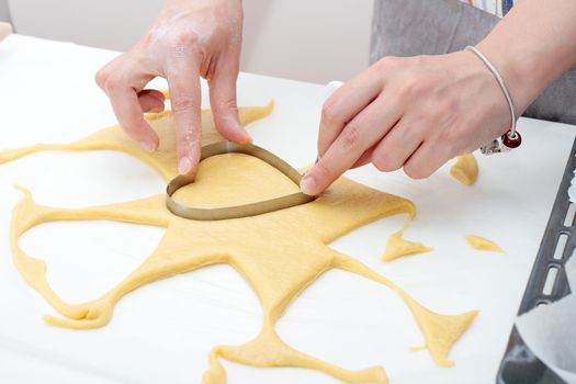 making cookies in the shape of a heart of the earth made handmade with natural ingredients