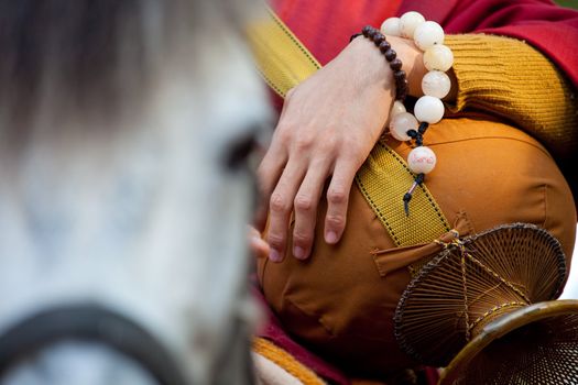 buddhist monk Riding horse