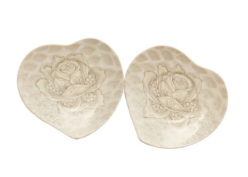 Two plate with roses on a white background