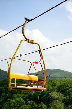 Cable car with nice sky anc forest background, Thailand