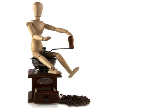 wooden man sitting on coffee machine