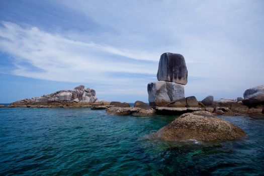 Beautiful tropical beach with big stones. Thailand