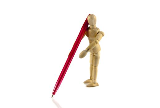 wooden boy writing with red pencil