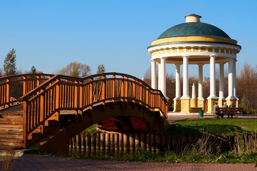 Gazebo and a bridge on the river  Yauza in Sviblovo