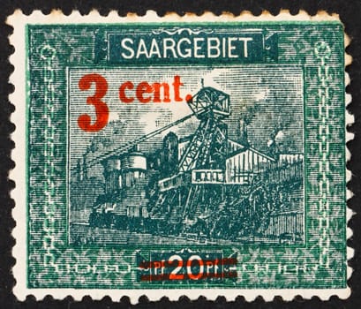 GERMANY - CIRCA 1921: a stamp printed in the Saar, Germany shows Entrance to Reden Mine, circa 1921