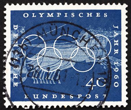 GERMANY - CIRCA 1960: a stamp printed in the Germany shows Chariot Race, Sport Scene from Greek Urn, 17th Olympic Games, Rome, circa 1960