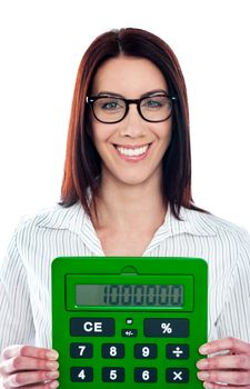 Smiling corporate lady showing green calculator to camera